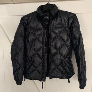 Women’s black North Face puffy jacket
